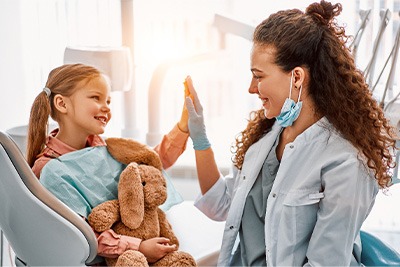Young patient in Plain City giving High Five