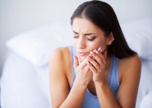 Woman experiencing a toothache